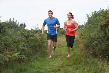 Fototapeta premium Couple On Run In Countryside