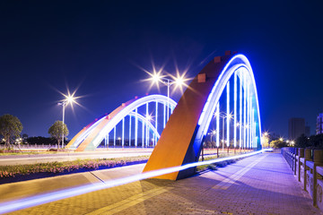 arch bridge with neon lamp