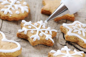 Christmas cinnamon cookies decorating process - obrazy, fototapety, plakaty