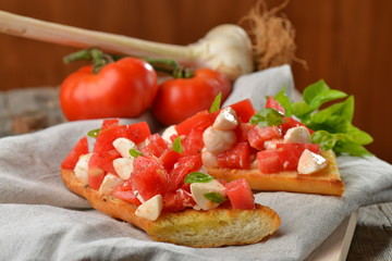 Fresh homemade crispy Italian antipasto called Bruschetta