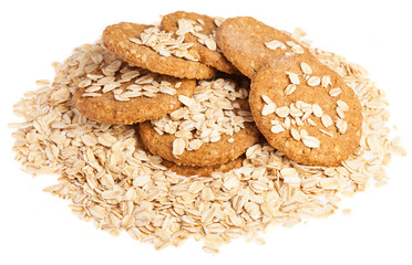 heap of oats and biscuits on a white background
