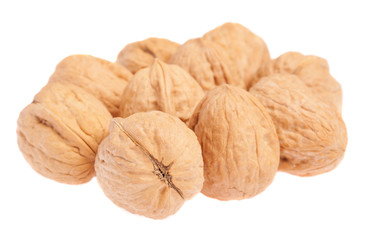 heap of walnuts isolated on a white background