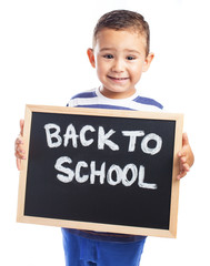 child holding a blackboard back to school on a white background