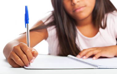 girl doing homeworks on a white background