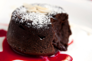 Delicious chocolate fondant with syrup close-up