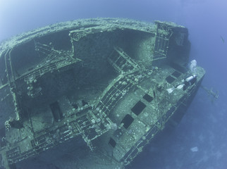 Scuba diver exploring a shipwreck