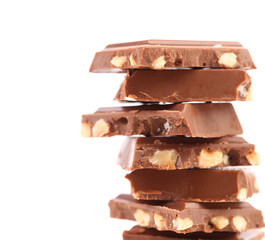 Stack of milk chocolate bar with nuts