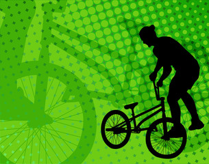Fototapeta na wymiar stunt bicyclist on the abstract background - vector