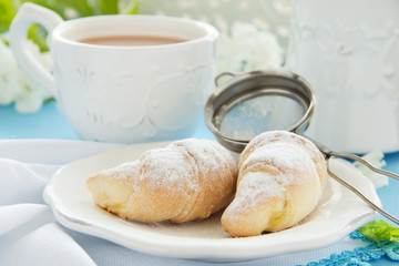 Homemade mini croissants with cream cheese.