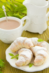 Homemade mini croissants with cream cheese.