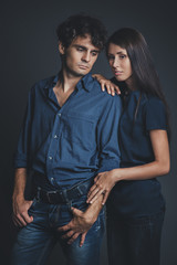 Studio portrait of young couple in love