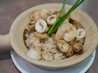 Clay Pot Seafood Rice with mushrooms
