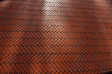 background made with red bricks in a herringbone