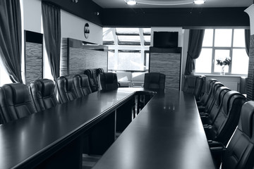 Interior of empty conference room in shades of grey