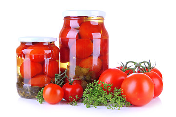 Tasty canned and fresh tomatoes, isolated on white