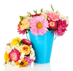 Fototapeta premium Beautiful bouquet of bright flowers in color vase, isolated