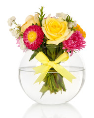 Beautiful bouquet of bright flowers in glass vase, isolated