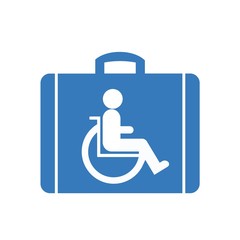 Personne handicapée en fauteuil roulant dans une valise