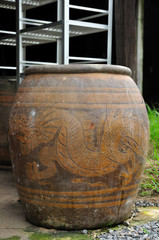 Ancient water jar with dragon, Thailand local.