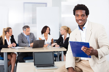 Portrait Of Happy African Businessman