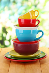 Mountain colorful dishes on nature background