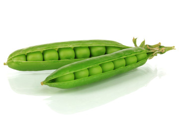 Sweet green peas isolated on white
