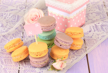 Macaroons on wooden table close-up