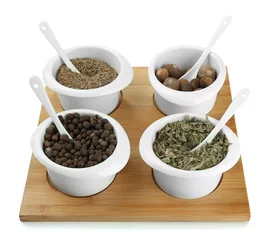 Foto op Canvas Assortment of spices in  white  bowls, © Africa Studio