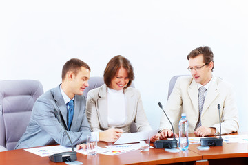 Three businesspeople at meeting