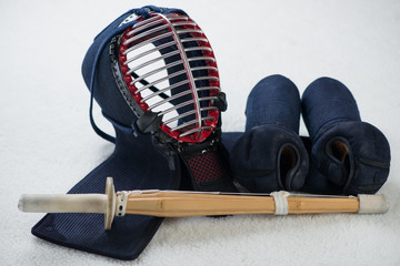 Kendo equipment: men, kote and shinai, studio shot