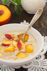 Breakfast, oatmeal with peaches.