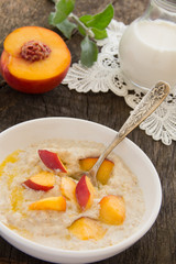 Breakfast, oatmeal with peaches.