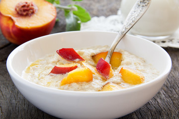 Breakfast, oatmeal with peaches.