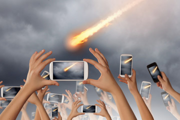 People taking photo of meteorite