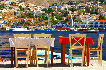 traditional Greece - tavernas near sea. Symi island, Dodecanese