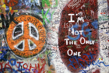 Colorful graffiti with modern art and peace symbol, Prague.