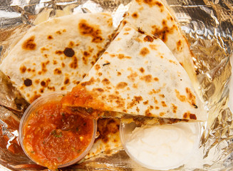 Sauce on Quesadillas with Sour Cream