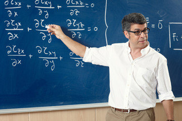 Professor giving class at the classroom