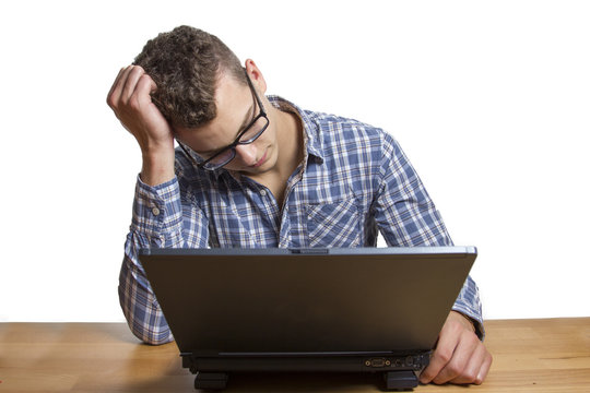 Desperate Man sitting at the Computer