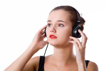 Naklejka premium attractive girl with headphones on white background