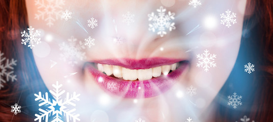 Pretty woman mouth blowing cold breeze