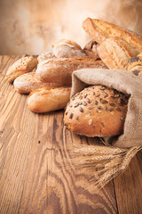 Fresh bread on wood