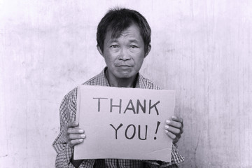 homeless man with sign