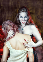 Beautiful vampire and her victim