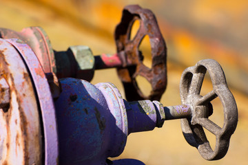 Close-up of a corroded valve or sillcock