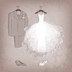 bride dress and groom's suit on grungy background