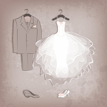 bride dress and groom's suit on grungy background