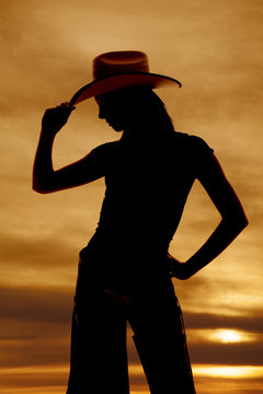 silhouette western woman hat tip side