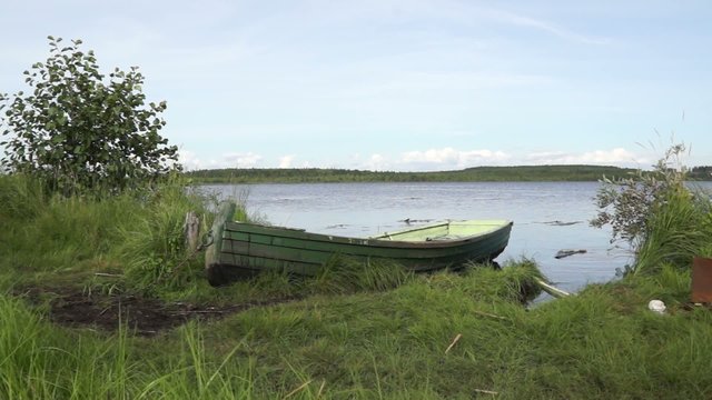 Fishing retro boat on the lake