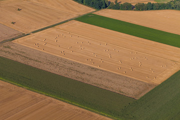 aerial view of harvest field and hay balls
